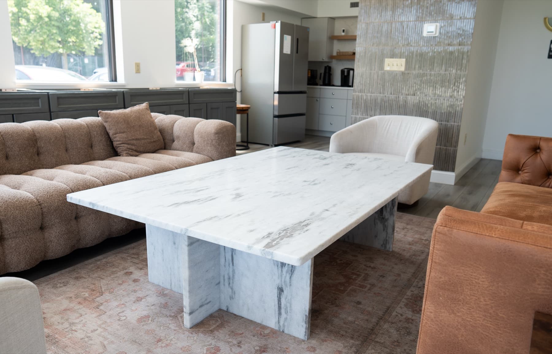 Custom Fantasy White Leather stone coffee table with a matching stone base in a living room